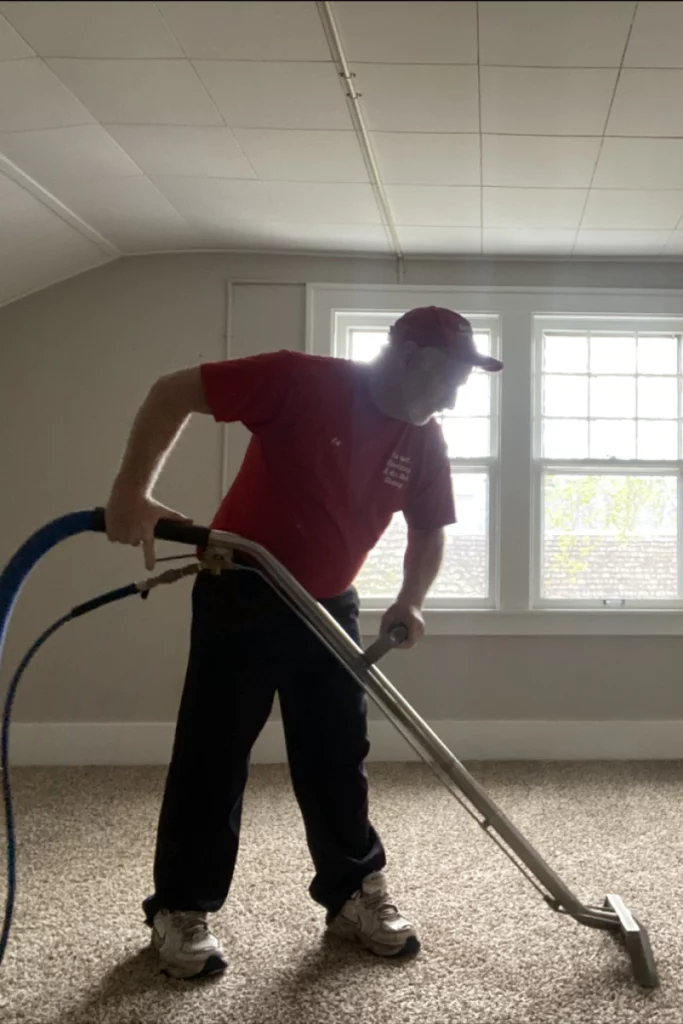 man cleaning a carpet waterford township mi